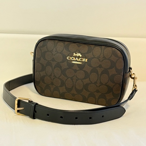 Coach Handbags - Coach Mini Jamie Camera Bag
Monogram Canvas Brown Black Leather
Crossbody